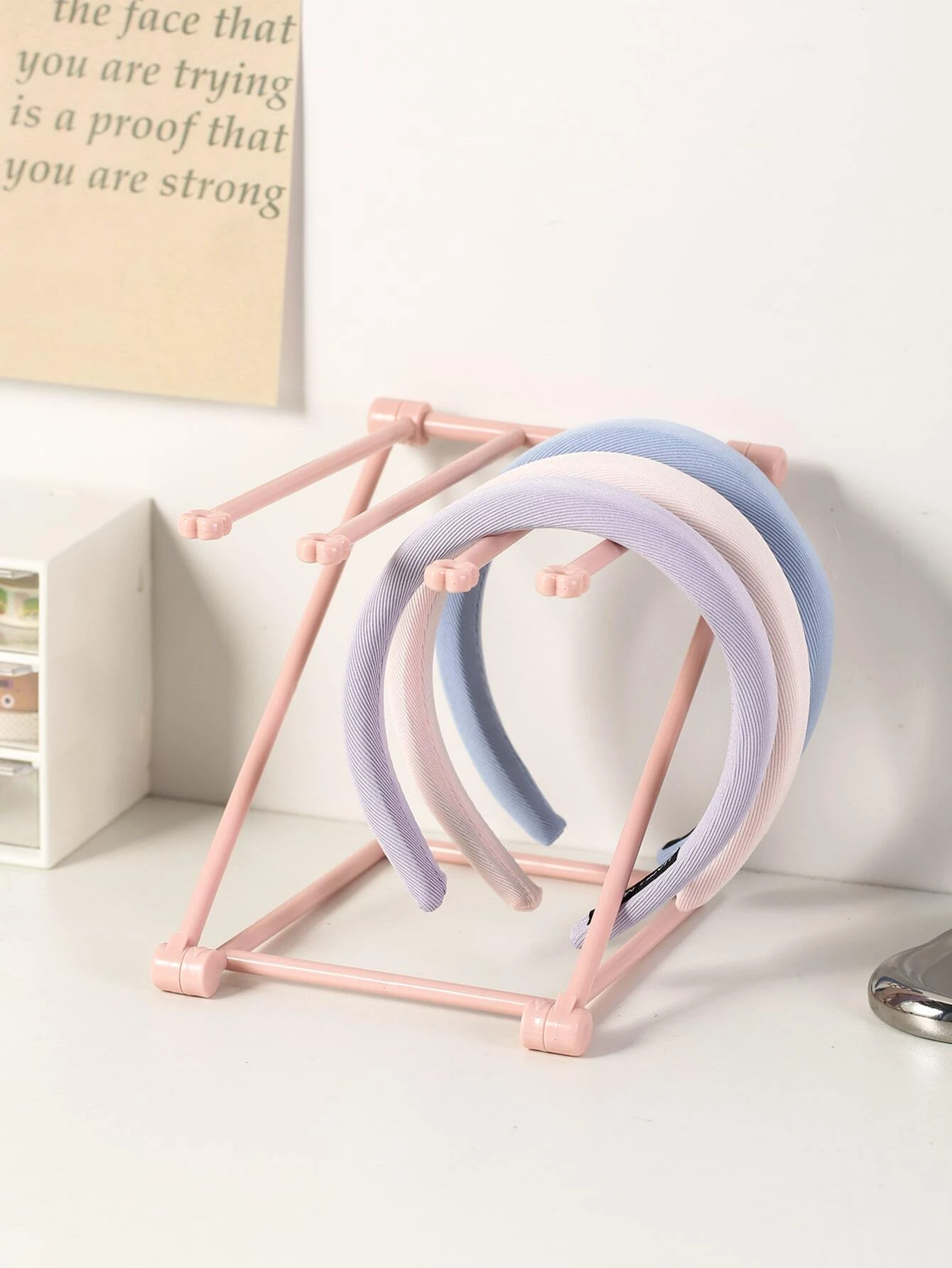 Foldable plastic rack for storing headwear, providing a convenient and space-saving solution for organizing your hats and accessories.