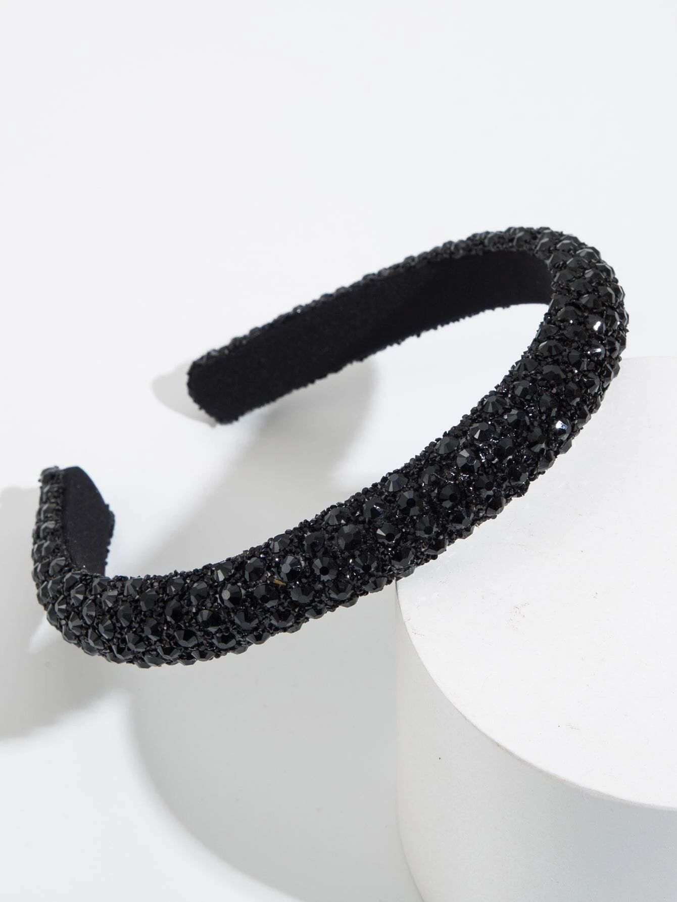 Headband adorned with rhinestone decorations, adding a touch of elegance and sparkle to your hair accessory.