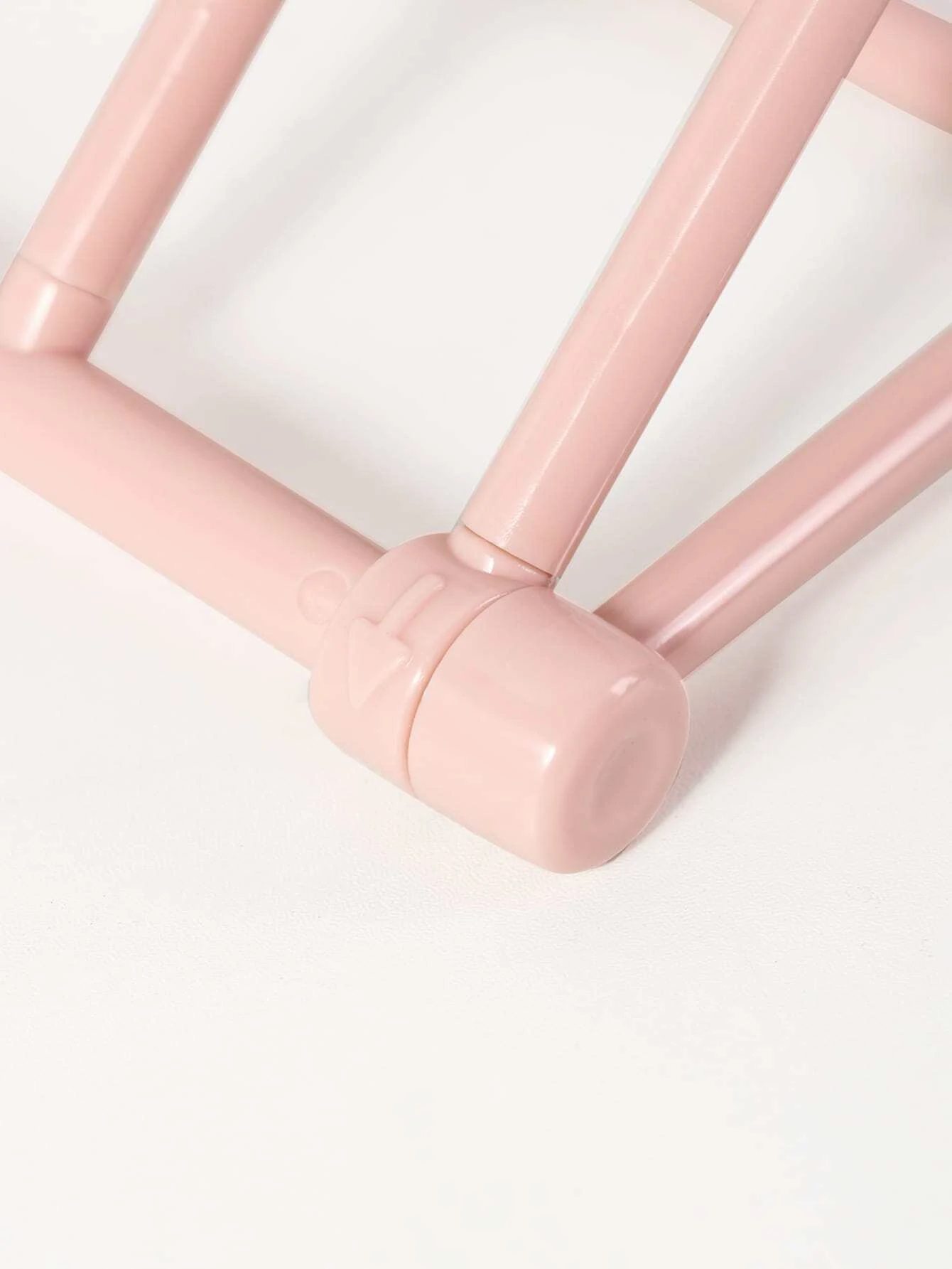 Foldable plastic rack for storing headwear, providing a convenient and space-saving solution for organizing your hats and accessories.