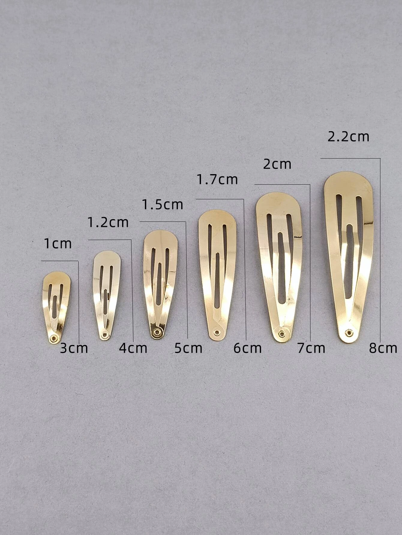 A set of 30 minimalist snap clips, offering sleek and simple hair accessories for versatile styling.