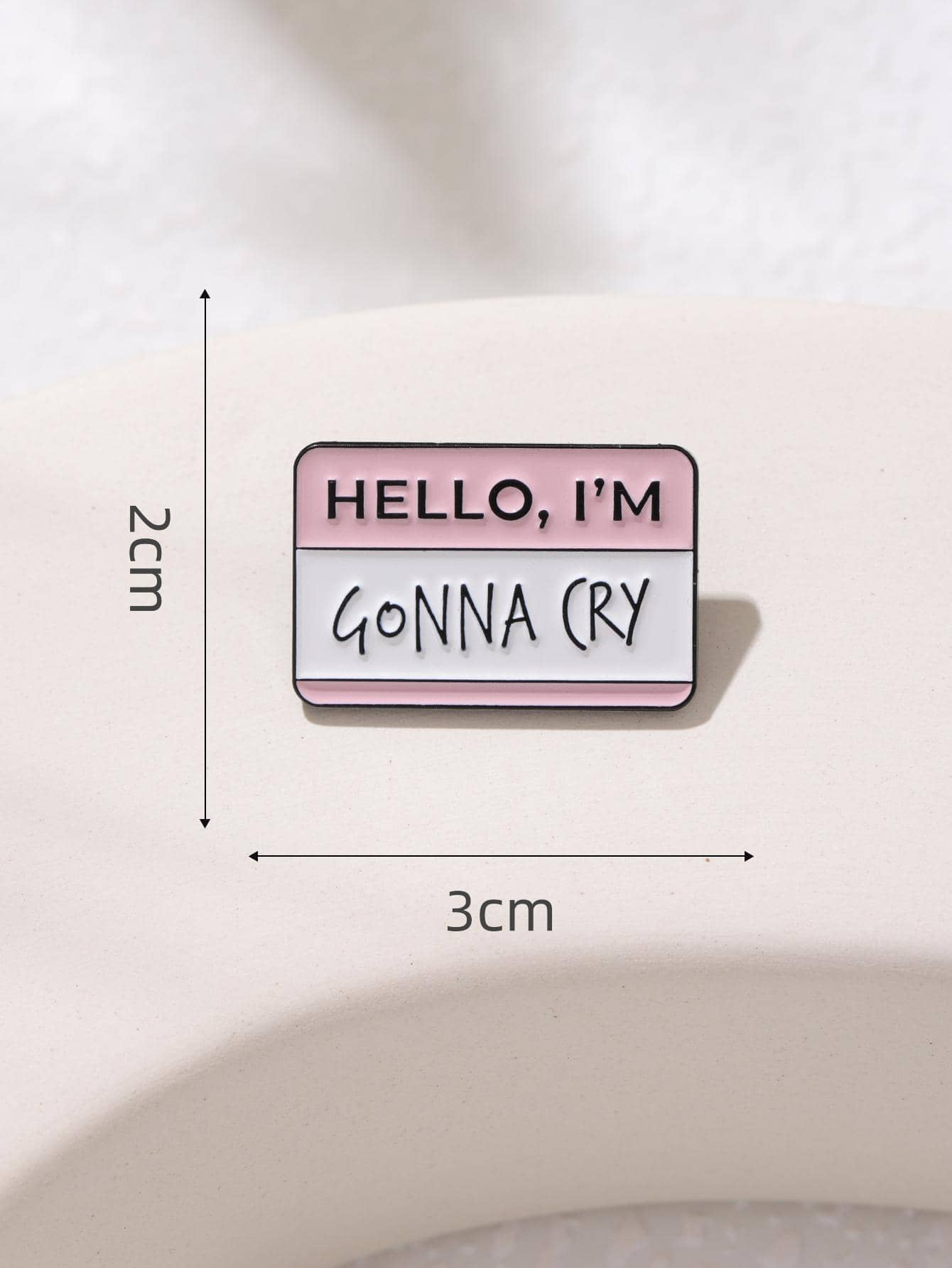 Brooch featuring a "I'm Gonna Cry" letter graphic design, expressing emotions in a creative and playful way through your accessory.
