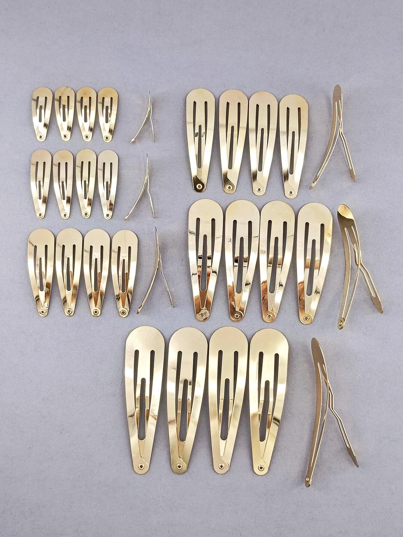 A set of 30 minimalist snap clips, offering sleek and simple hair accessories for versatile styling.