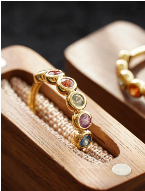 A glamorous sterling silver ring adorned with cubic zirconia gems. The ring features sparkling cubic zirconia stones set within an intricately designed sterling silver setting. The combination of the shimmering gemstones and the lustrous silver creates a captivating and elegant look. This ring is a stylish and sophisticated accessory that adds a touch of opulence and luxury to any outfit.