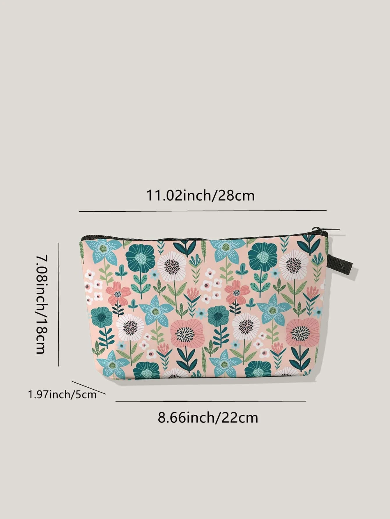 Makeup bag with a charming flower print and zipper closure. This accessory offers a blend of style and practicality, perfect for storing and carrying your cosmetics in a trendy and organized manner.