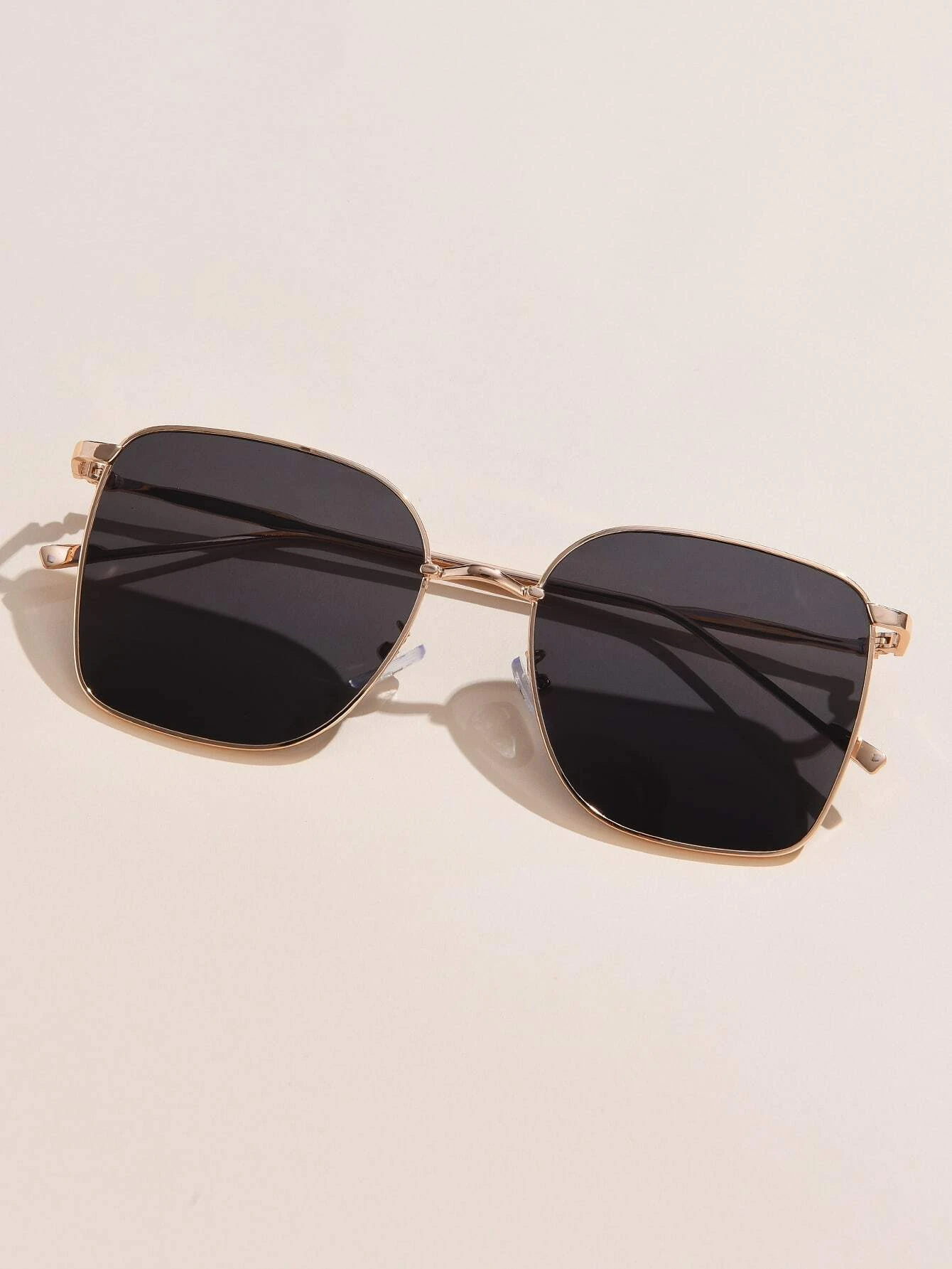 Metal Square Frame Sunglasses with a modern and sophisticated design. These sunglasses feature square frames crafted from metal, combining contemporary style with durable construction for sun protection and fashion.