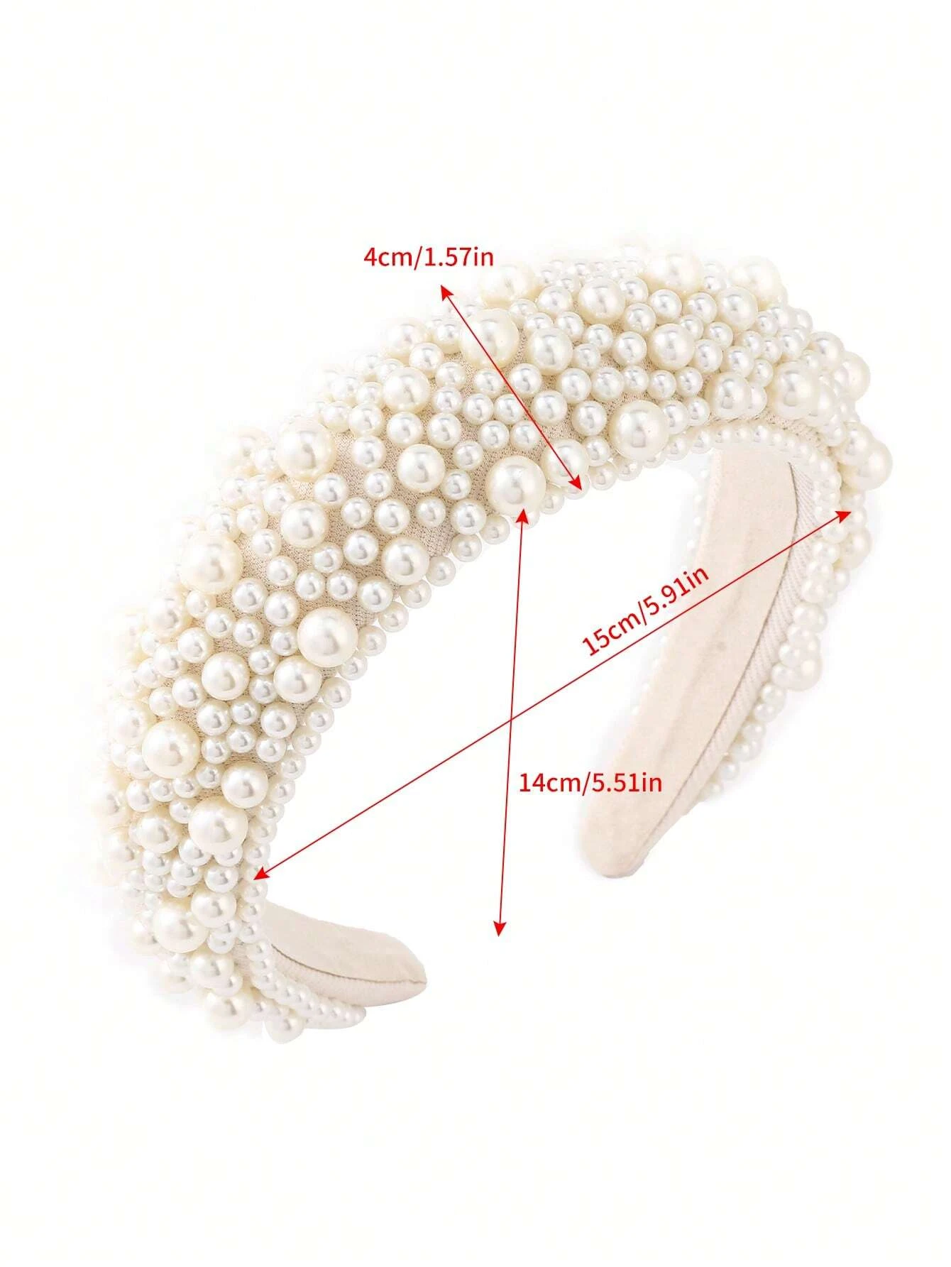 Wide headband adorned with white faux pearls, offering a chic and stylish accessory to elevate your hair look.