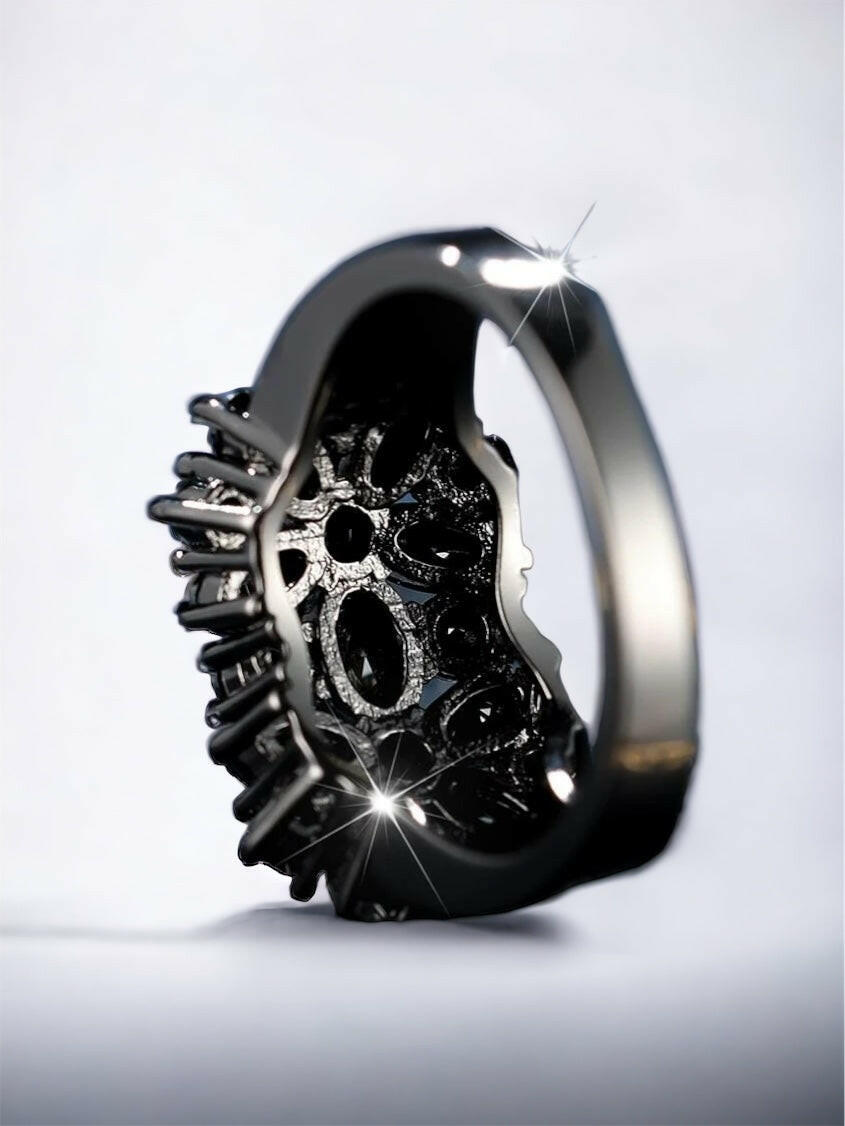 A chic cuff ring adorned with rhinestones, featuring intricate details. The ring showcases sparkling rhinestones set within an elegantly designed cuff-style band. The combination of the shimmering gems and the sleek metal creates a captivating and fashionable look. This cuff ring is a stylish and versatile accessory that adds a touch of elegance and glamour to any outfit.