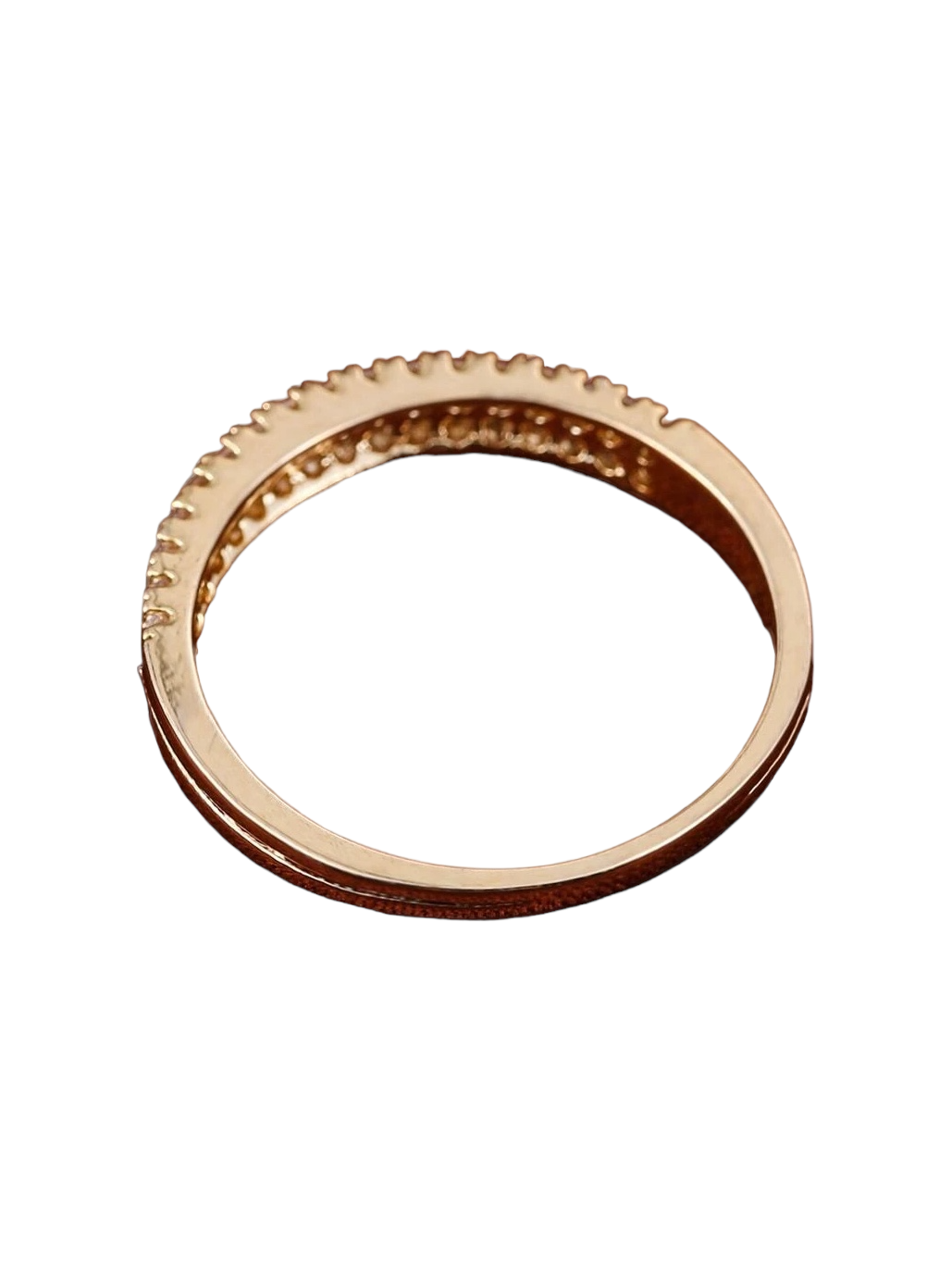 A dazzling gold ring adorned with cubic zirconia gems. The ring showcases brilliant cubic zirconia stones set within an elegantly designed gold setting. The sparkling gemstones and the lustrous gold combine to create a captivating and glamorous appearance. This ring is a stylish and sophisticated accessory that adds a touch of opulence and luxury to any outfit.