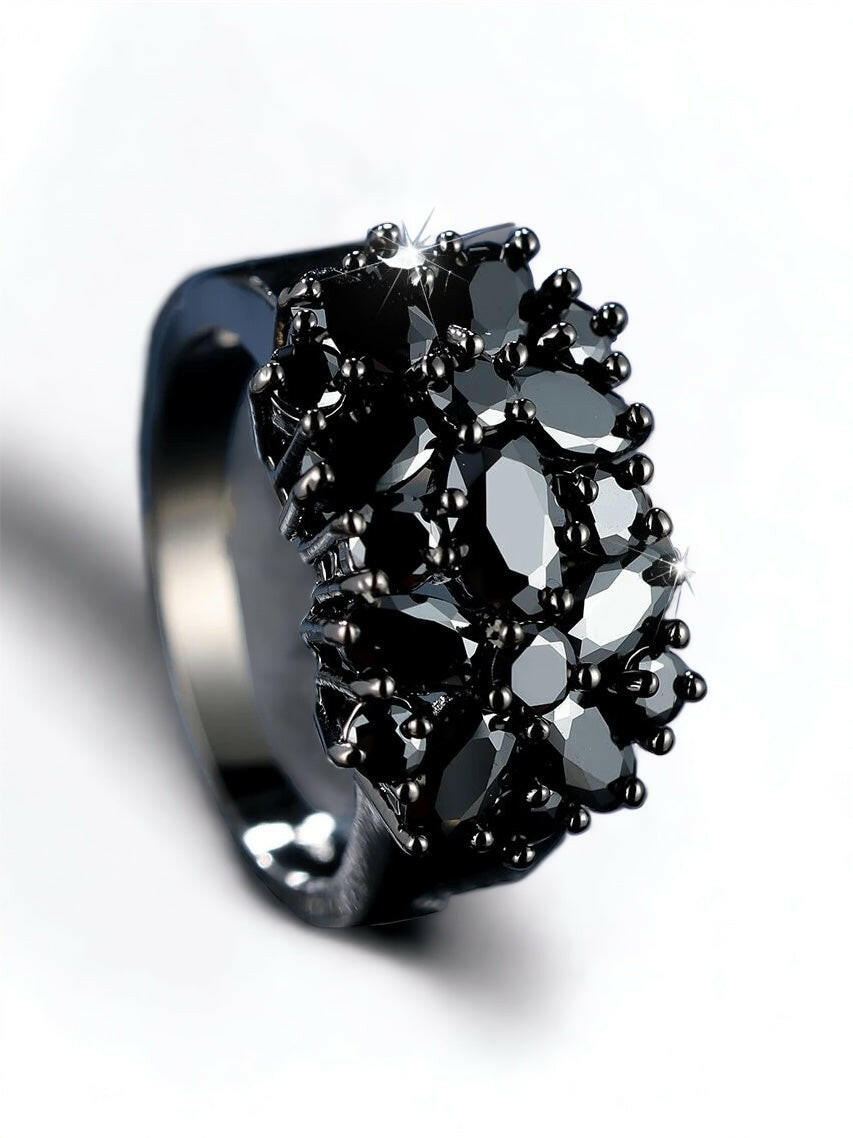 A chic cuff ring adorned with rhinestones, featuring intricate details. The ring showcases sparkling rhinestones set within an elegantly designed cuff-style band. The combination of the shimmering gems and the sleek metal creates a captivating and fashionable look. This cuff ring is a stylish and versatile accessory that adds a touch of elegance and glamour to any outfit.