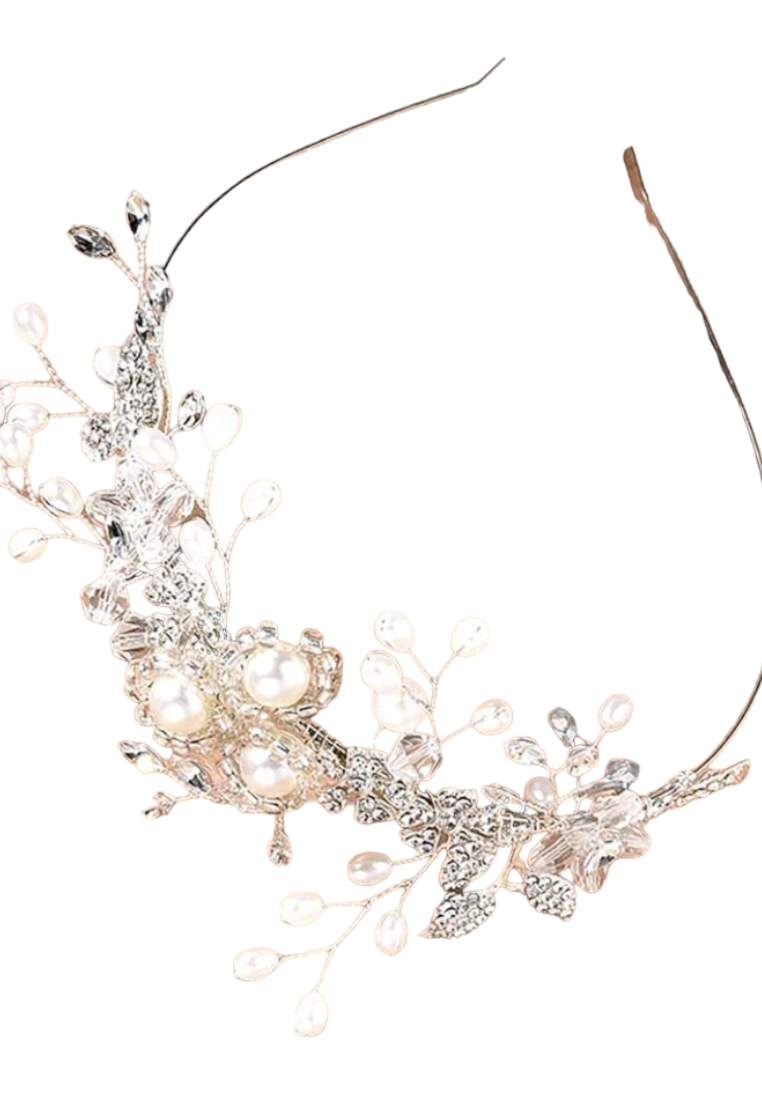 An elegant bridal headband adorned with faux pearls and delicate decorative elements. The headband features a graceful arrangement of lustrous faux pearls, creating a timeless and sophisticated look for brides on their special day.