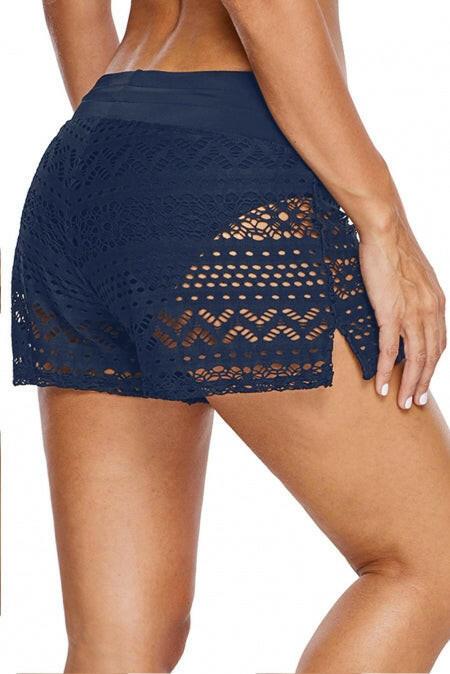 Swim bottom with attached blue lace shorts. These shorts feature a lovely blue lace design, seamlessly integrated with the swimwear bottom. The shorts offer a unique and stylish twist to traditional swimwear, combining comfort and fashion. The blue lace adds a touch of sophistication, making this swim bottom a versatile choice for poolside or beach outings. The attached lace shorts bring a playful and trendy element to the overall look.