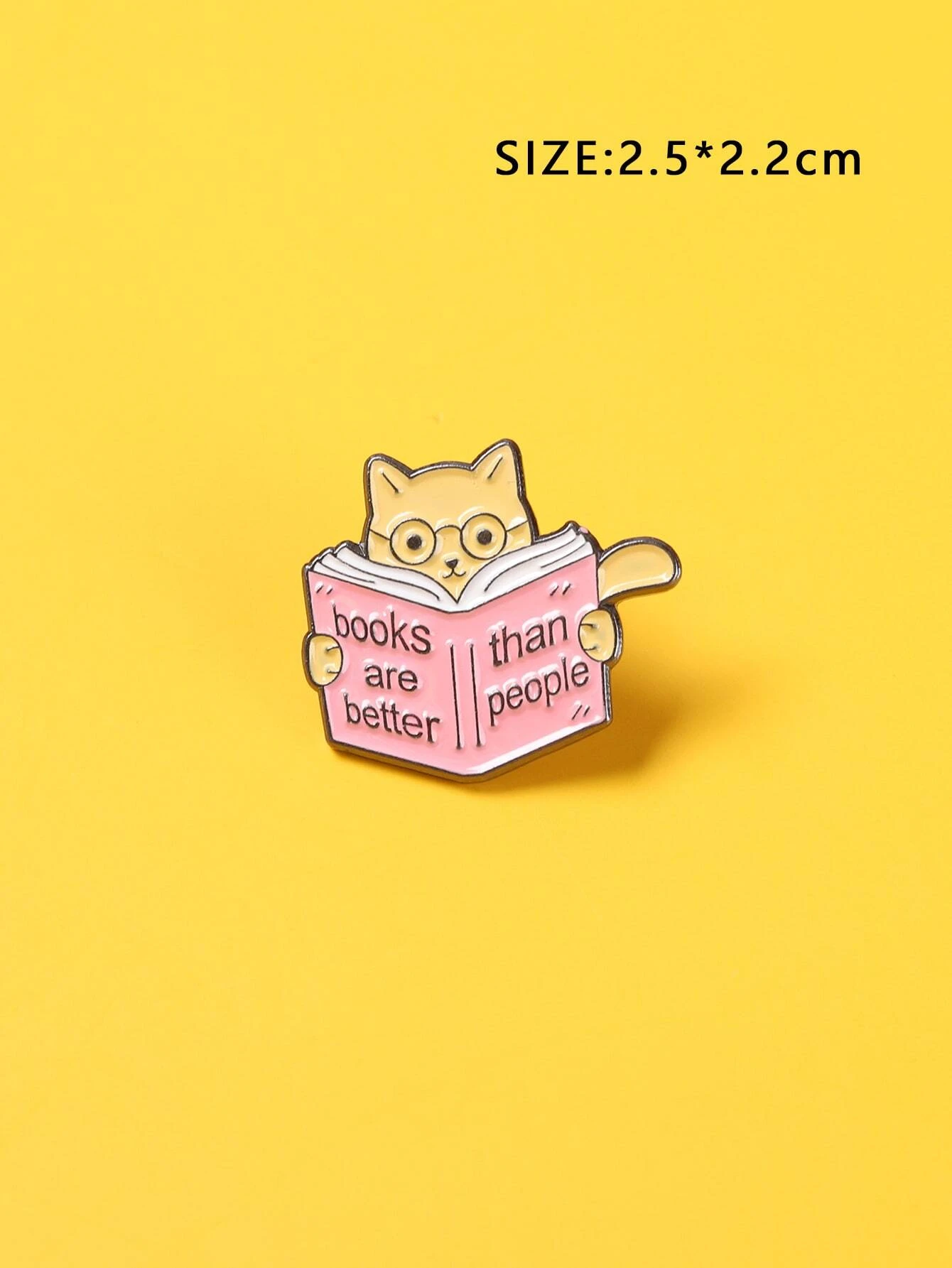 A brooch designed in the shape of a book, adding a literary and intellectual touch to your attire or accessories.