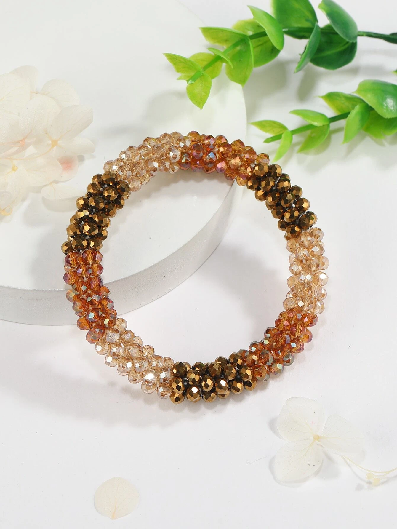 Vibrant color block beaded bracelet, showcasing a playful arrangement of bold and contrasting beads in various shapes and sizes, creating a lively and eye-catching accessory.