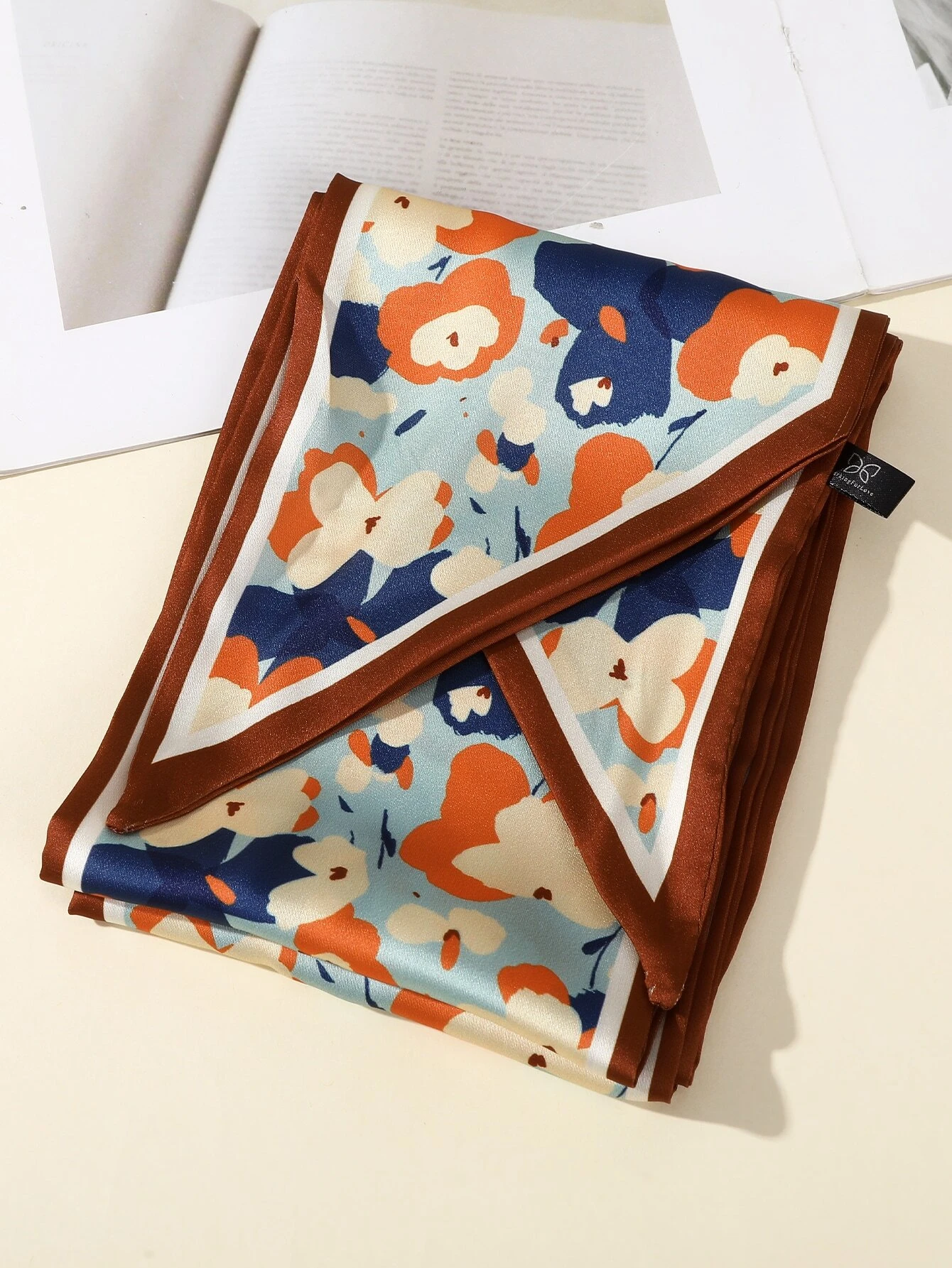 Hair band featuring a floral pattern, adding a touch of nature-inspired charm to your hairstyle.