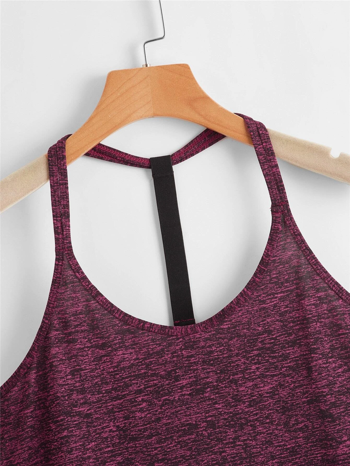 Image of a 2-piece space dye sports cami top set. The set includes a camisole-style top and a matching bottom, both featuring a space dye pattern, suitable for active and leisurely wear.