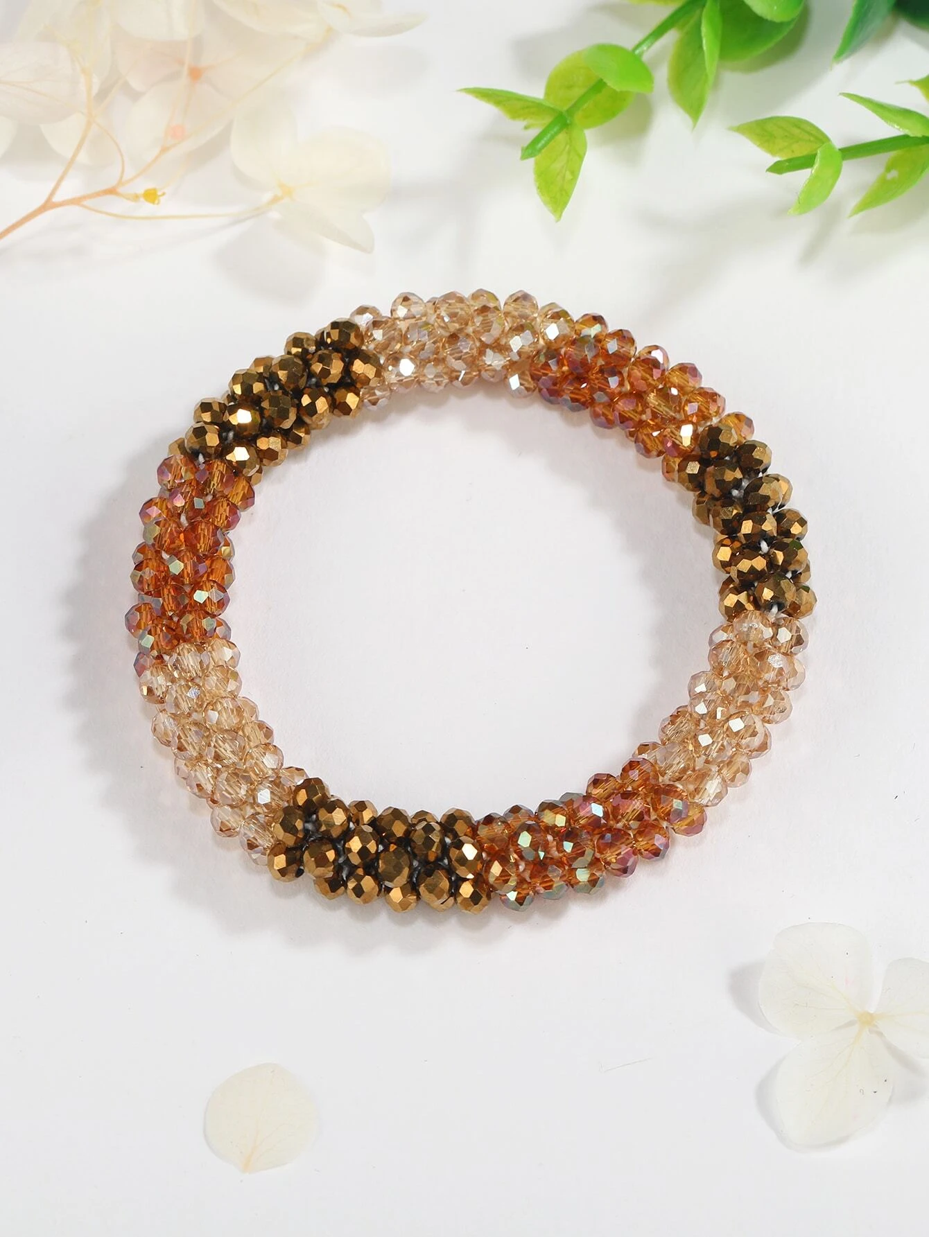 Vibrant color block beaded bracelet, showcasing a playful arrangement of bold and contrasting beads in various shapes and sizes, creating a lively and eye-catching accessory.