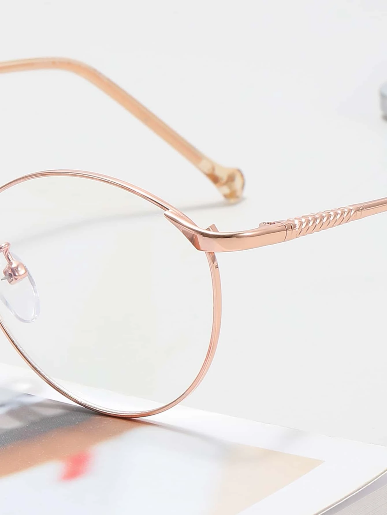 These Metal Frame Anti-Blue Light Eyeglasses offer UV400 protection and reduce blue light radiation from digital screens without sacrificing style. Their metal frame is both lightweight and durable, making them comfortable to wear for hours of continuous use. Enjoy reduced eye strain and improved sleep quality with these eyeglasses.