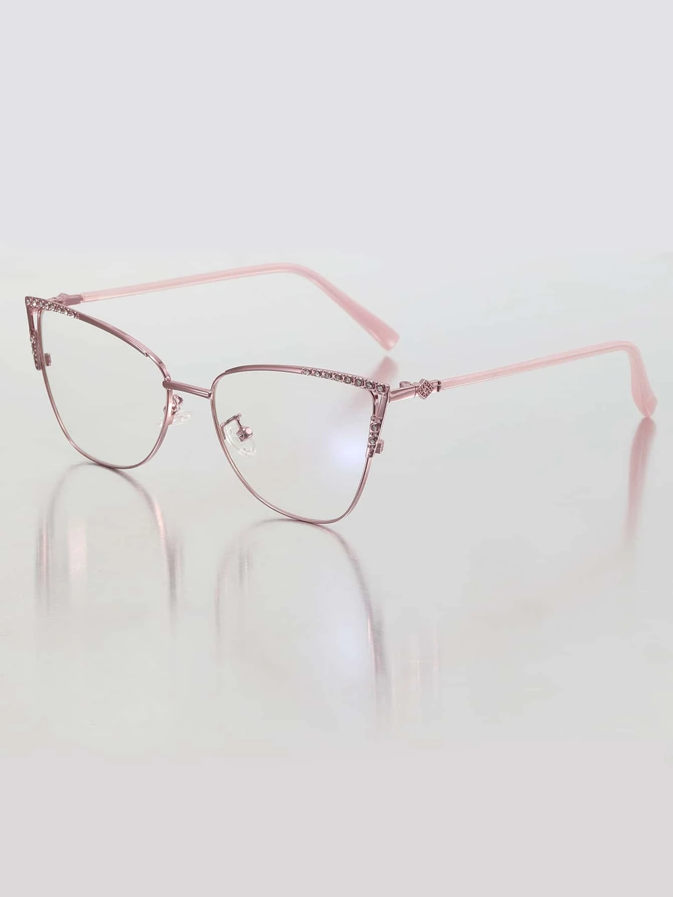These glamorous Rhinestone Decor Cat Eye Eyeglasses offer a stylish look and superior anti-blue light protection. The stylish rhinestone detail blocks up to 40% of harmful blue light, while providing a classic cat eye look.