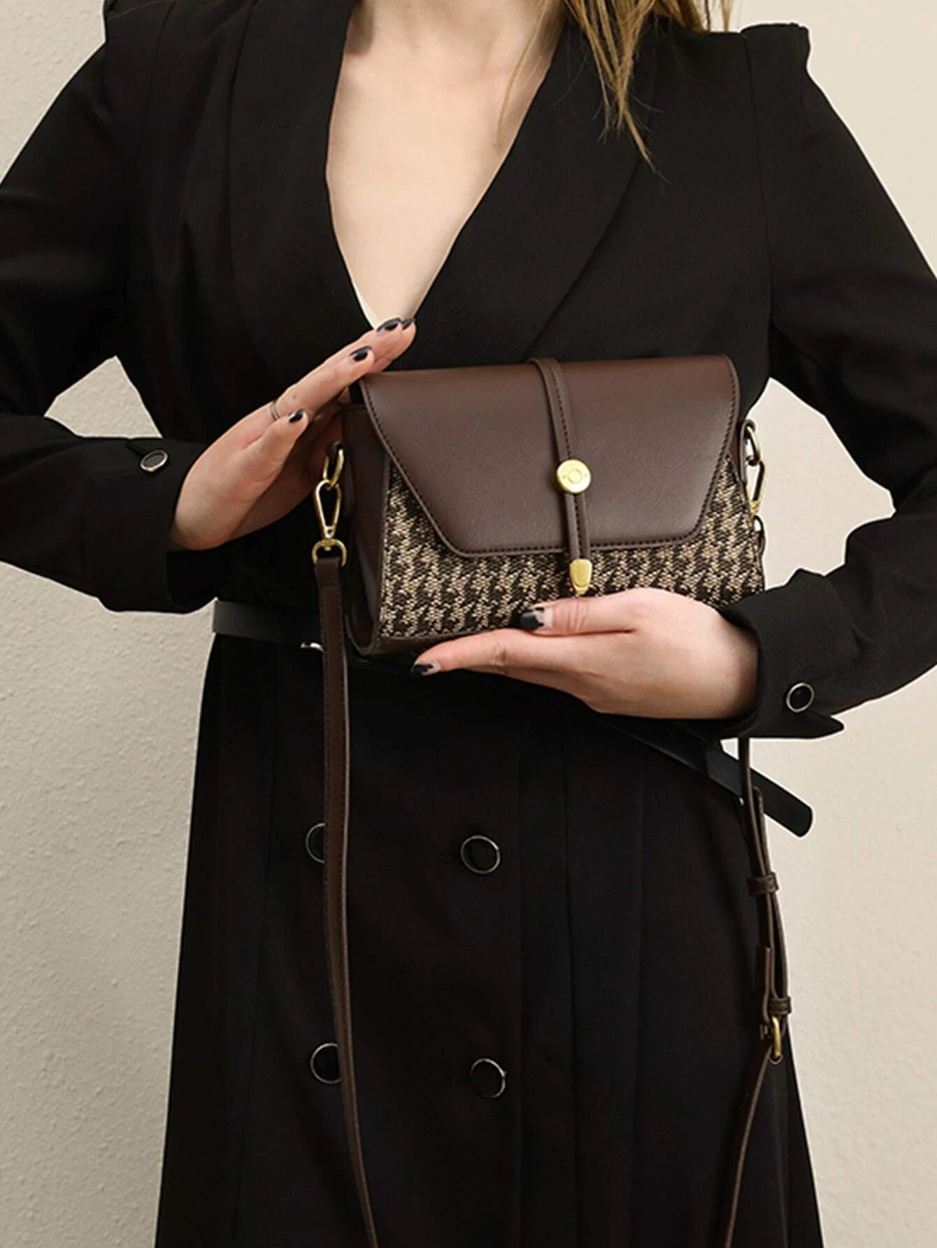 Mini square bag with houndstooth pattern flap. This accessory combines classic design with modern elements, offering a chic and stylish way to carry your essentials.