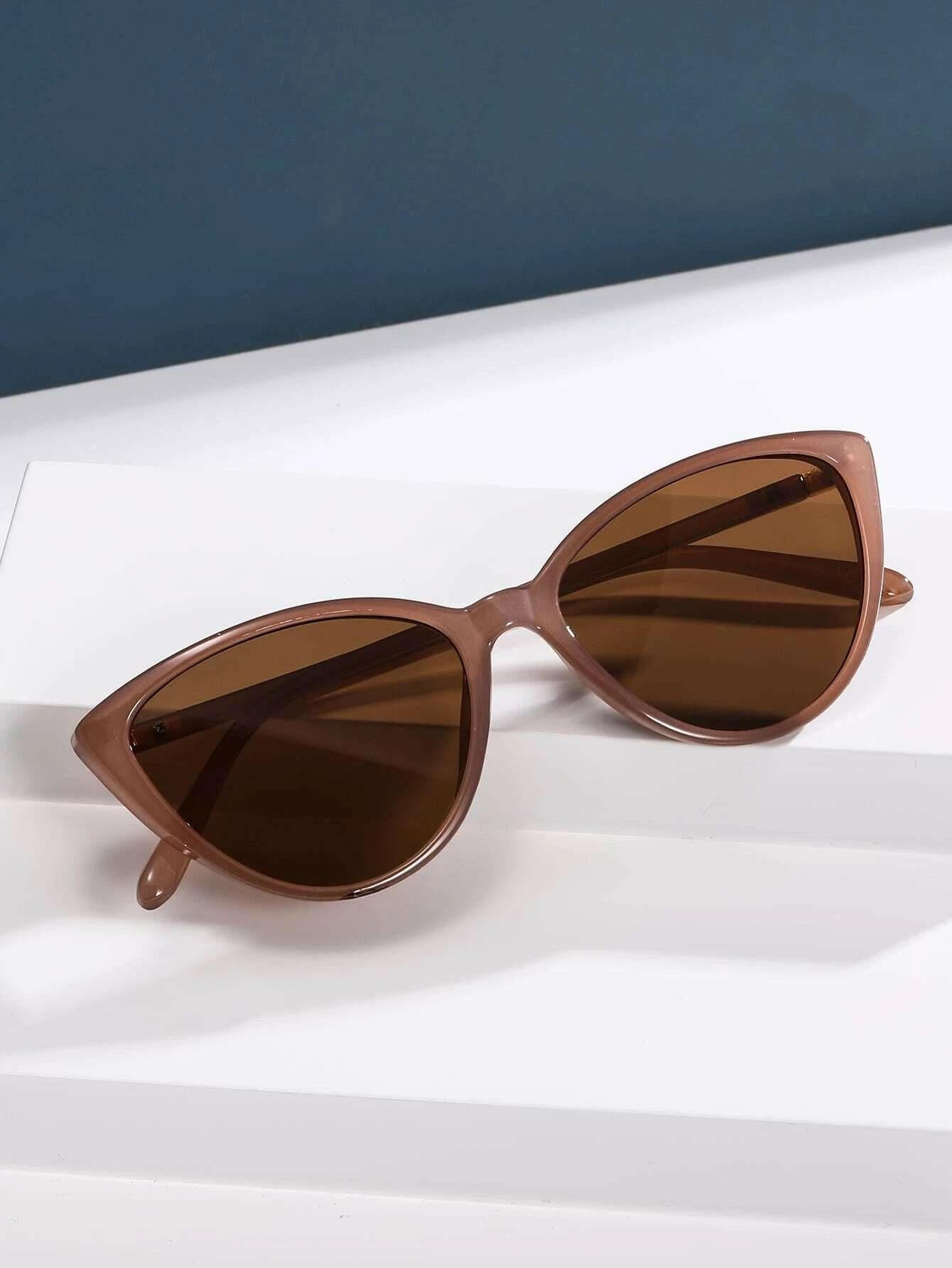 Cat Eye Sunglasses with a classic and alluring design. These sunglasses feature the iconic cat-eye frame shape, adding a touch of elegance and sophistication to your look.