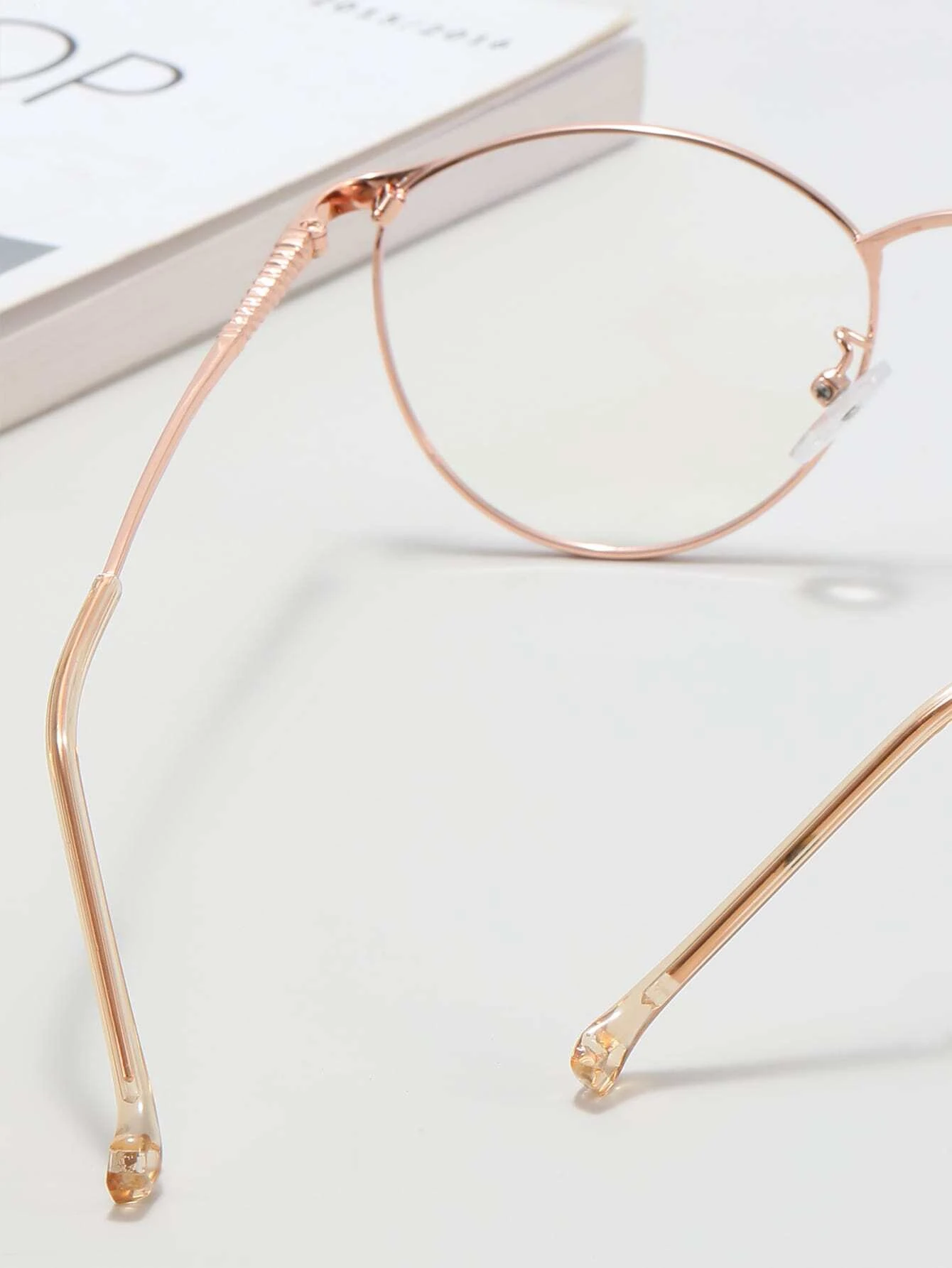 These Metal Frame Anti-Blue Light Eyeglasses offer UV400 protection and reduce blue light radiation from digital screens without sacrificing style. Their metal frame is both lightweight and durable, making them comfortable to wear for hours of continuous use. Enjoy reduced eye strain and improved sleep quality with these eyeglasses.