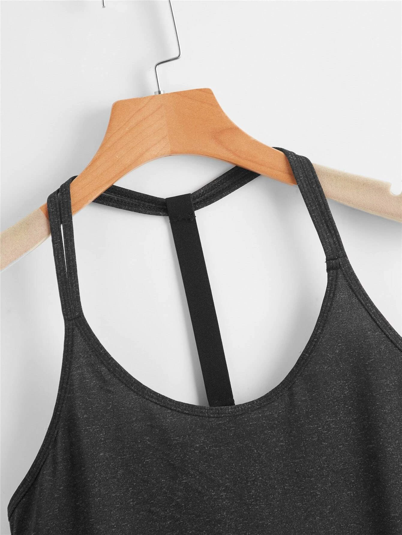 Image of a 2-piece space dye sports cami top set. The set includes a camisole-style top and a matching bottom, both featuring a space dye pattern, suitable for active and leisurely wear.