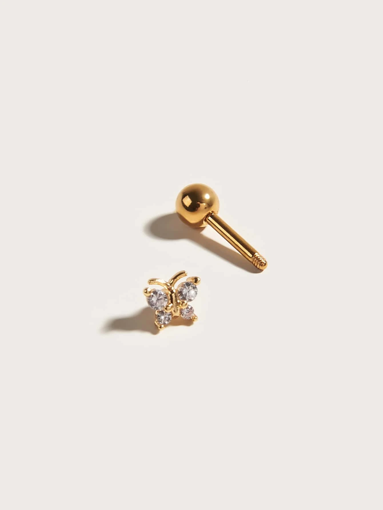 One rhinestone butterfly decor stud earring, a sparkling and whimsical accessory featuring a butterfly design, adding a touch of elegance and playfulness to your look.