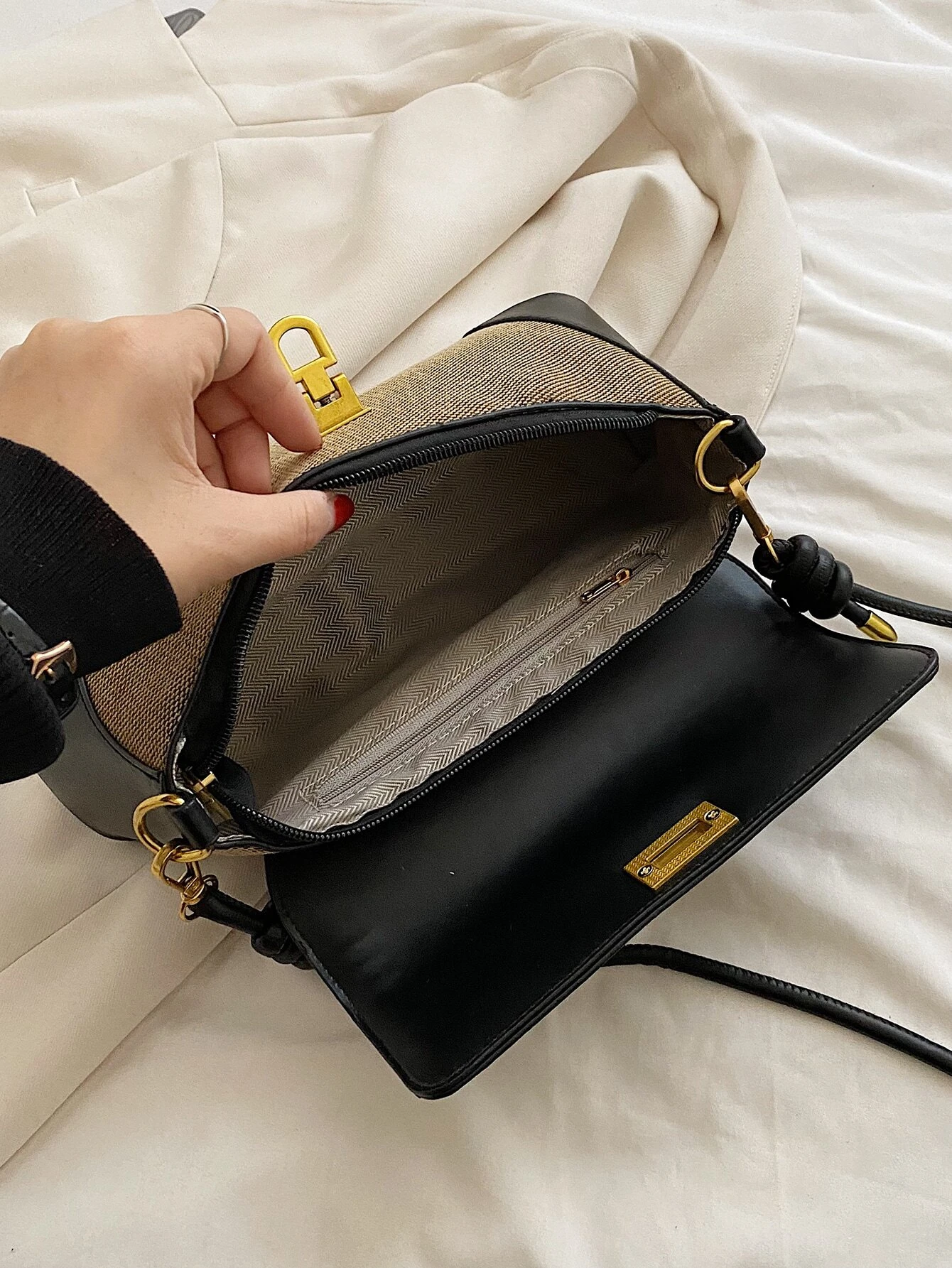 Two-tone flap baguette bag with a blend of colors. This accessory offers a sleek and stylish way to carry your essentials, embodying modern elegance and functionality.
