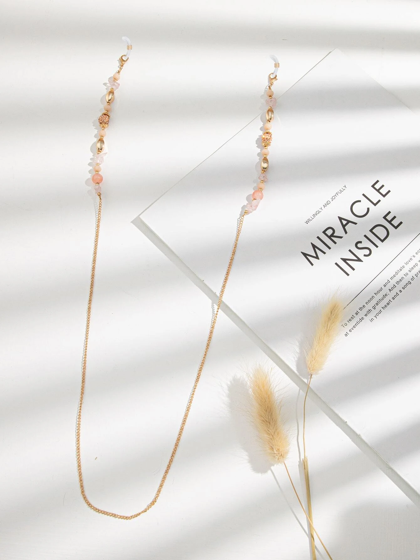 Glasses chain with crystal decorations, a blend of practicality and elegance to keep your eyewear stylishly close.