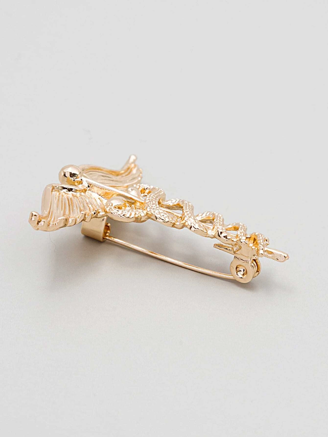 Single creative brooch, showcasing a unique and artistic design for a standout and expressive accessory.