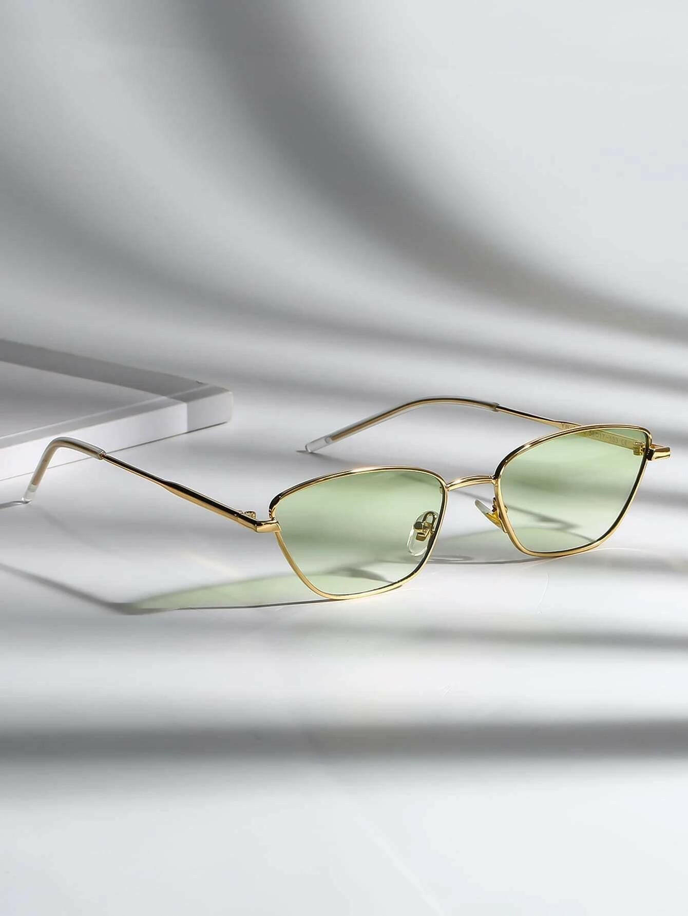 Tinted Lens Sunglasses with a stylish and functional design. These sunglasses feature lenses with a tinted shade, offering both fashion-forward aesthetics and sun glare protection.