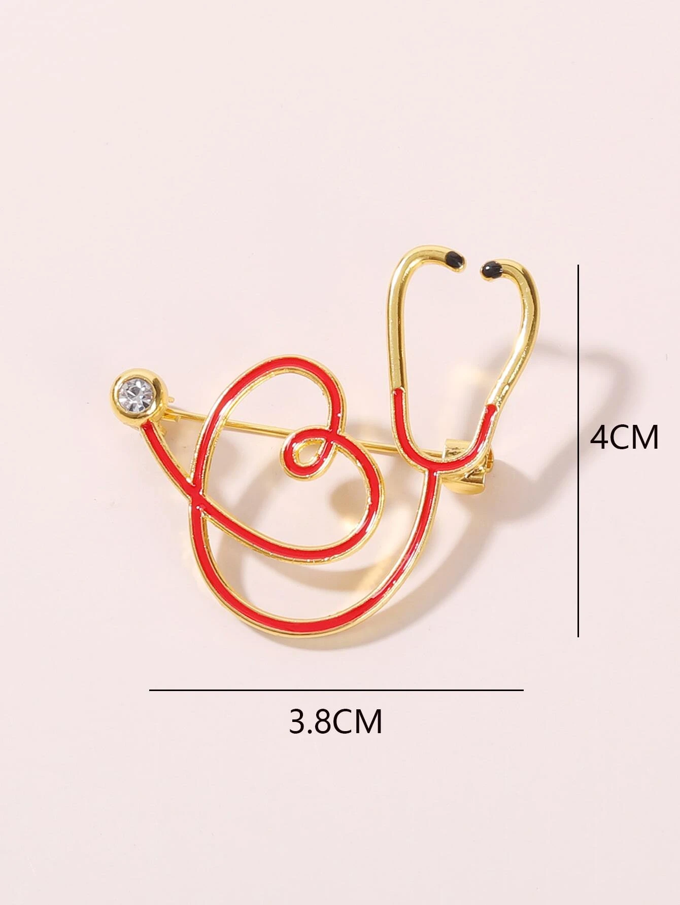 Brooch featuring a stethoscope design, a symbolic and stylish accessory for healthcare professionals or those who appreciate their dedication.