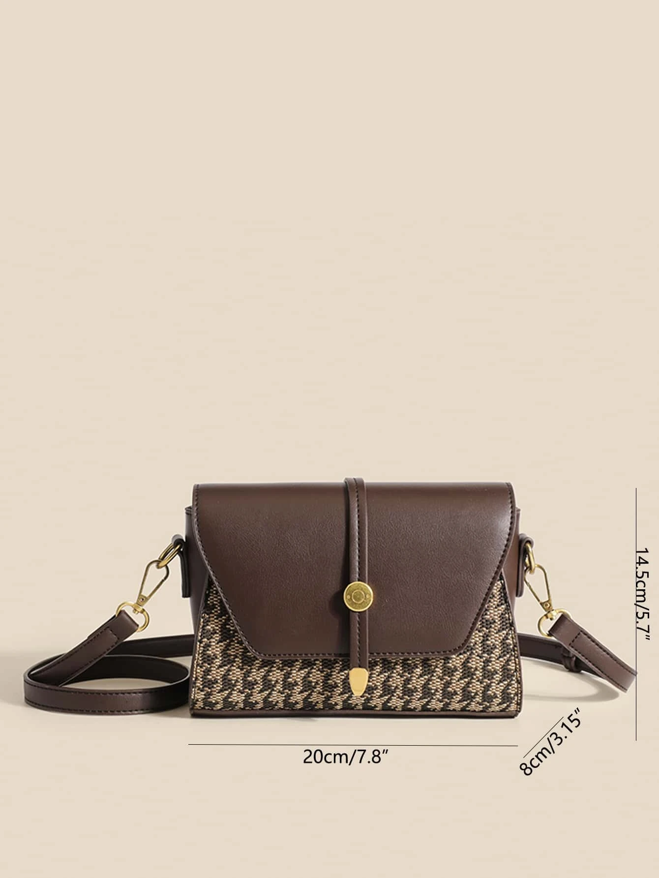 Mini square bag with houndstooth pattern flap. This accessory combines classic design with modern elements, offering a chic and stylish way to carry your essentials.