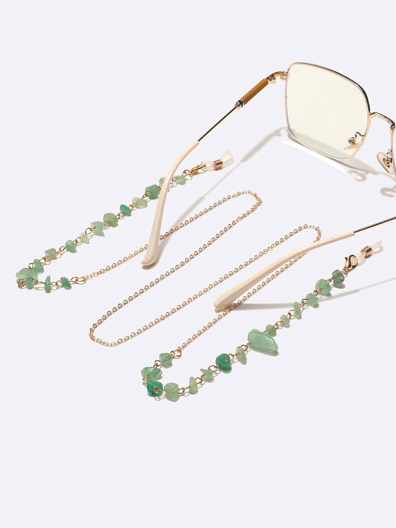 Glasses chain adorned with stylish stone decorations, providing a fashionable and functional accessory for your eyewear.