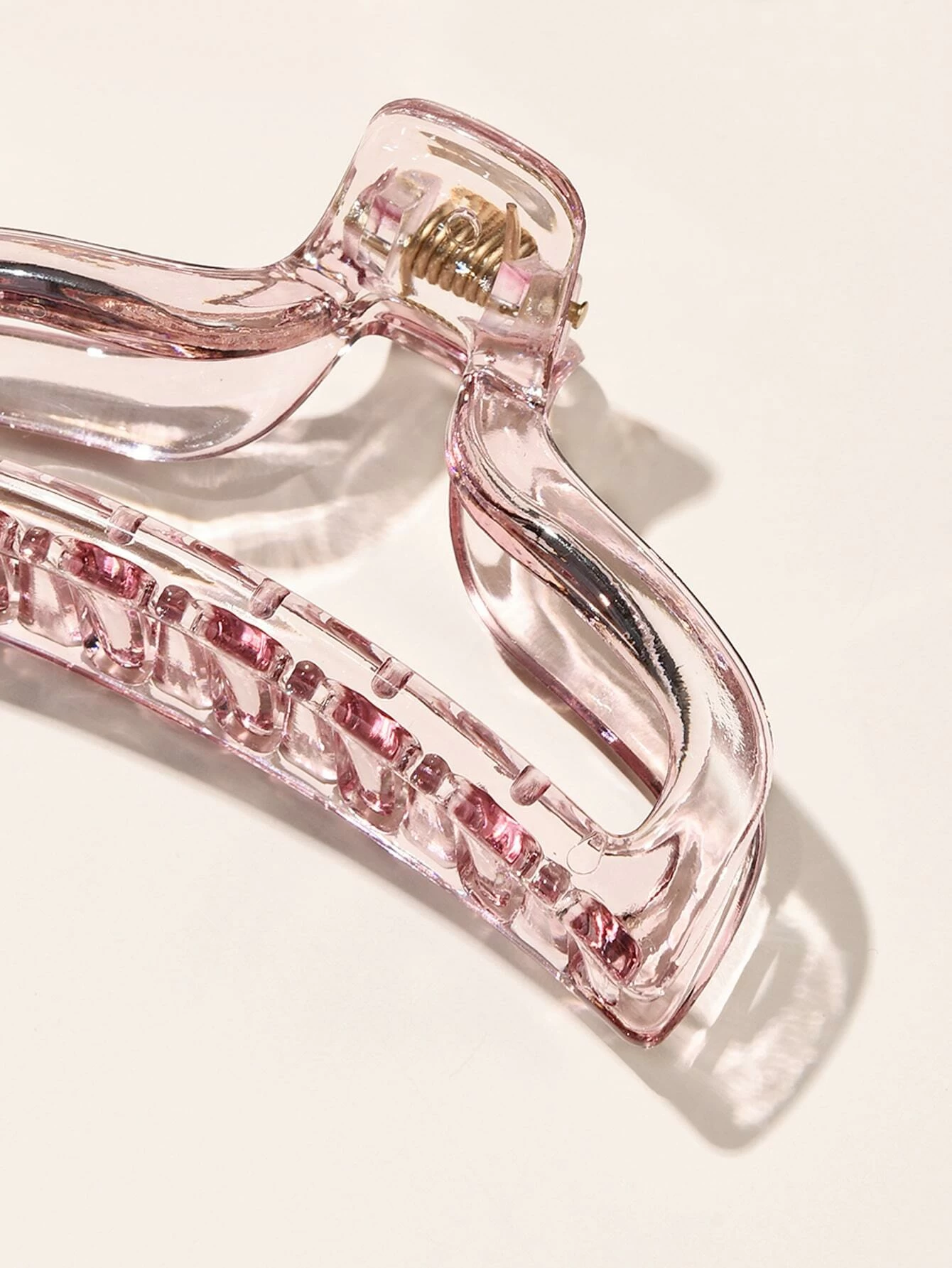 Set of two transparent hair claw clips, offering a versatile and functional accessory to secure your hair in various styles.