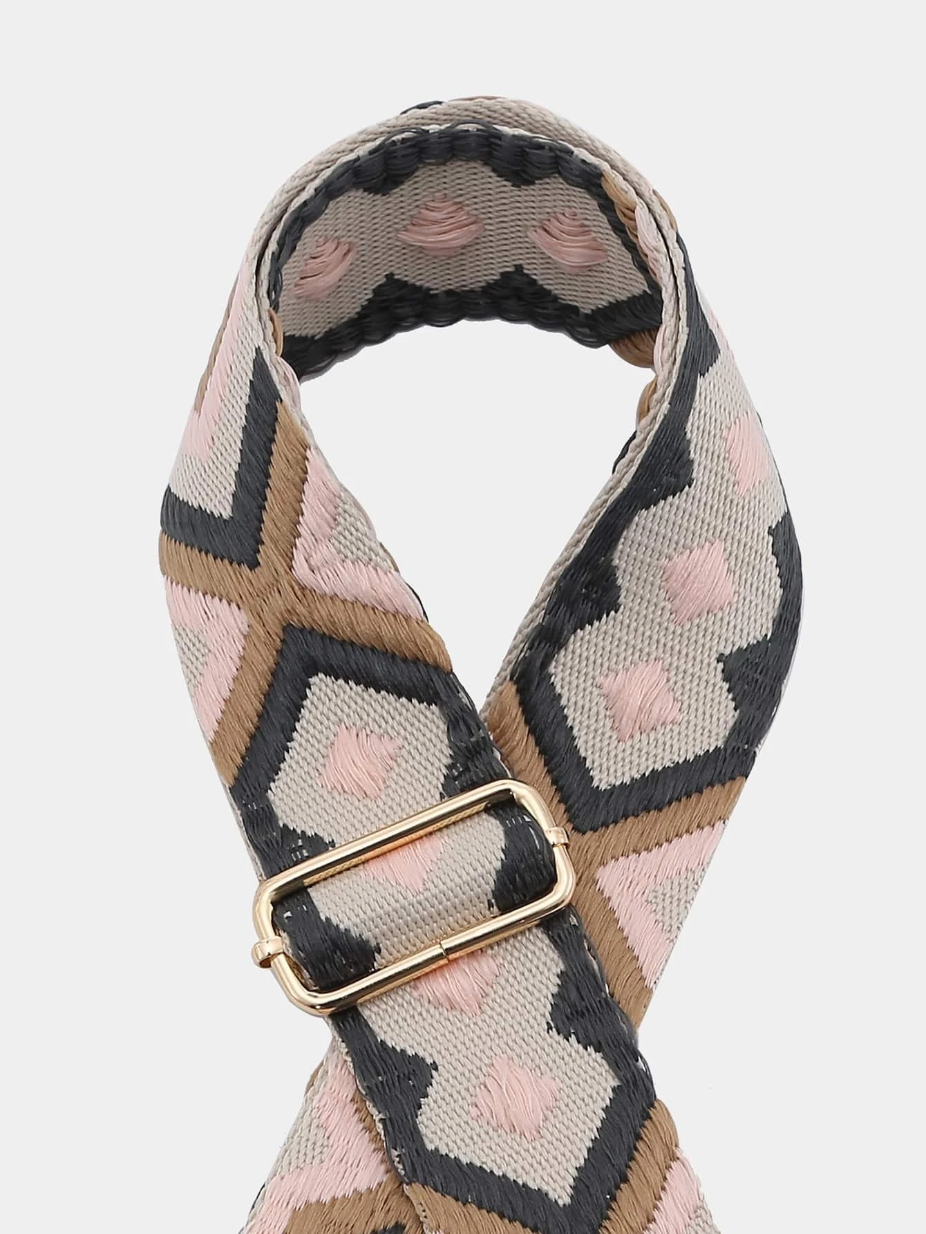 Bag strap adorned with intricate geometric embroidery. This accessory adds a touch of modern artistry and design, enhancing the visual appeal of your bag with its stylish geometric patterns.