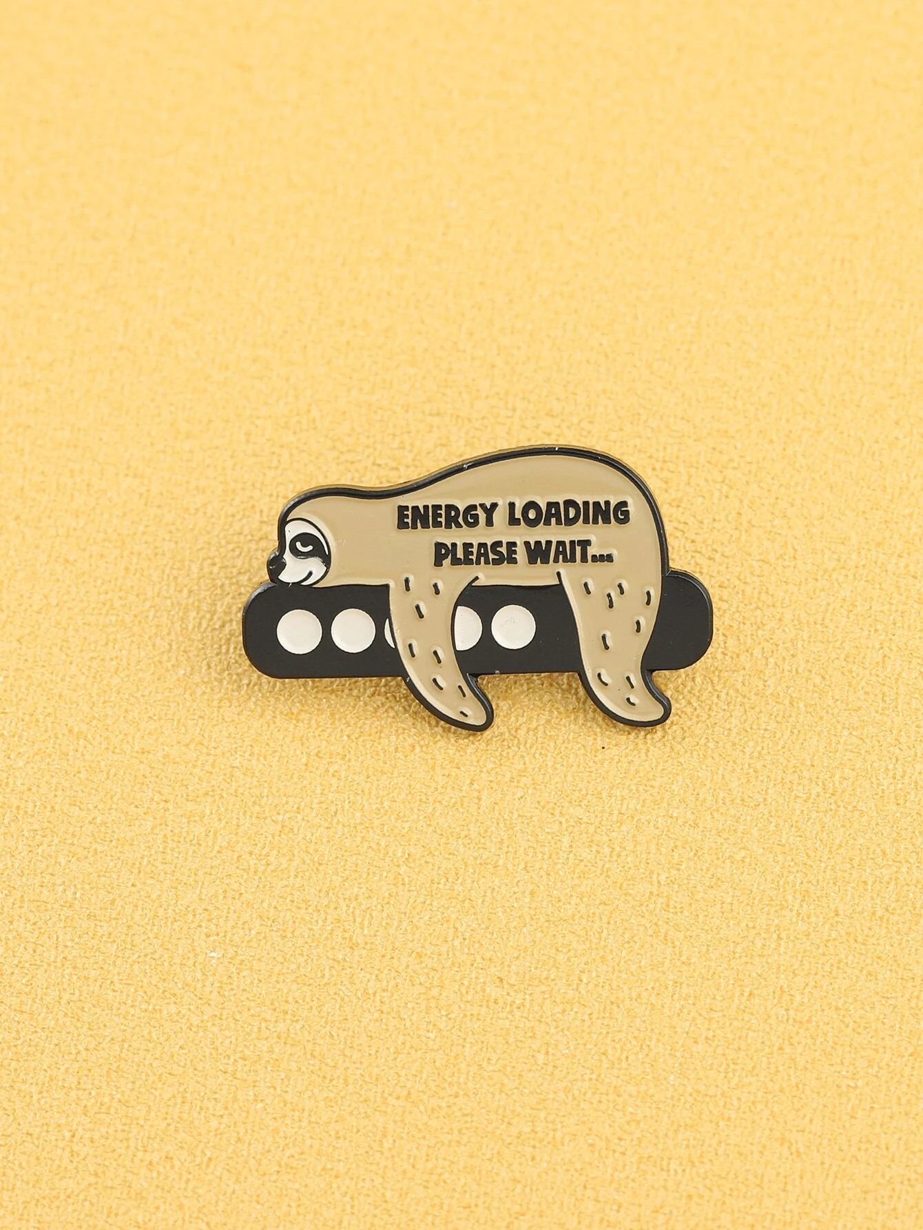 Adorable cartoon sloth brooch featuring a cute and laid-back sloth character with a charming smile. The brooch captures the relaxed nature of sloths in a playful and artistic design, making it a unique and endearing accessory for sloth lovers and those who appreciate a touch of whimsy.
