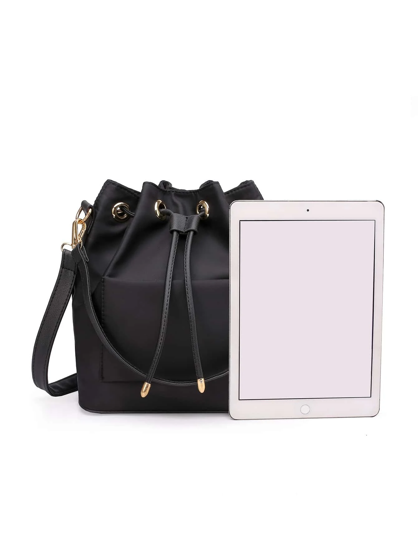 Bucket bag with a minimalist drawstring design. This accessory blends contemporary style with functional elements, offering a chic and versatile way to carry your essentials.