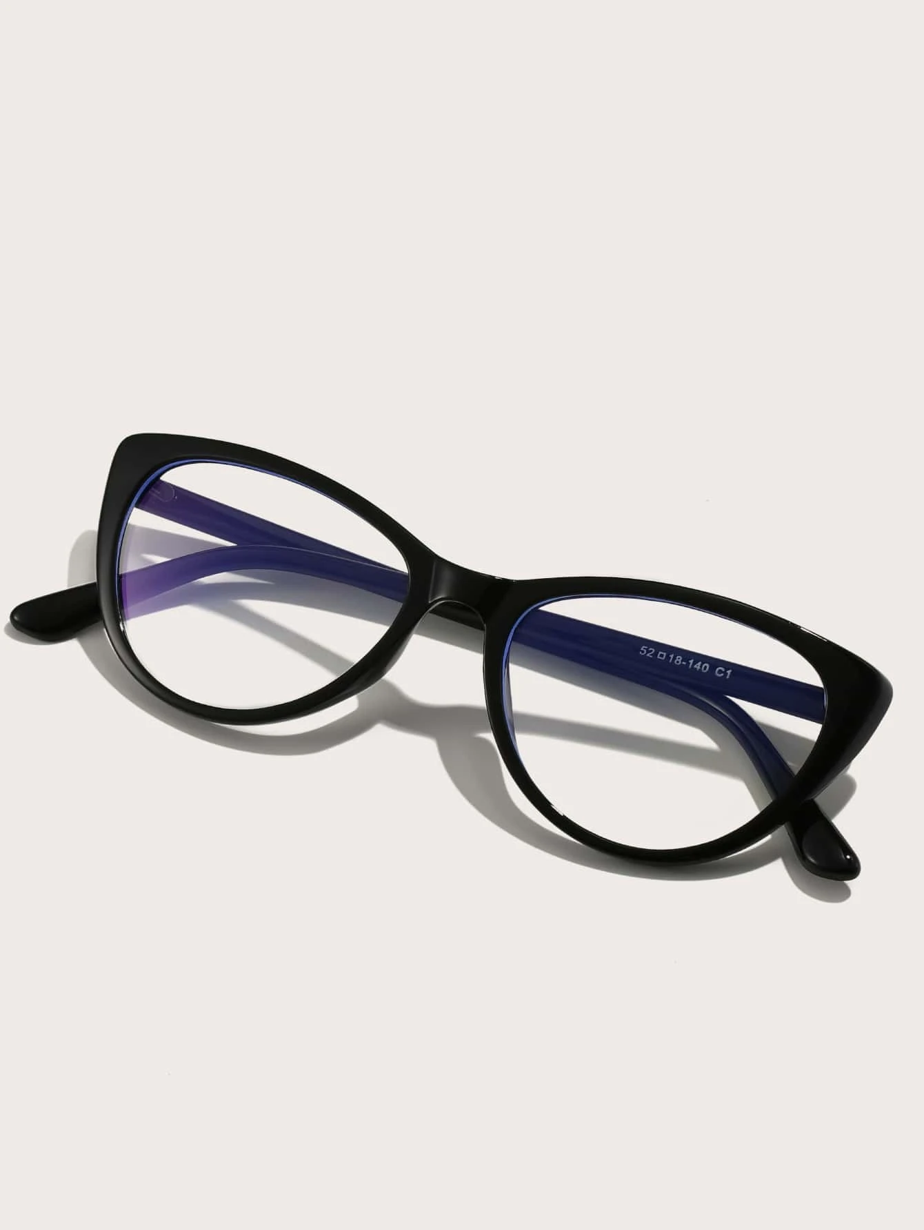 Look stylish and protect your eyes with our Cat Eye Anti-Blue Light Eyeglasses. Our glasses are designed with a cat eye silhouette and feature a special blue light filter, providing protection from harmful blue light emitted by digital screens. Enjoy lasting comfort with our glasses, designed for all-day use.
