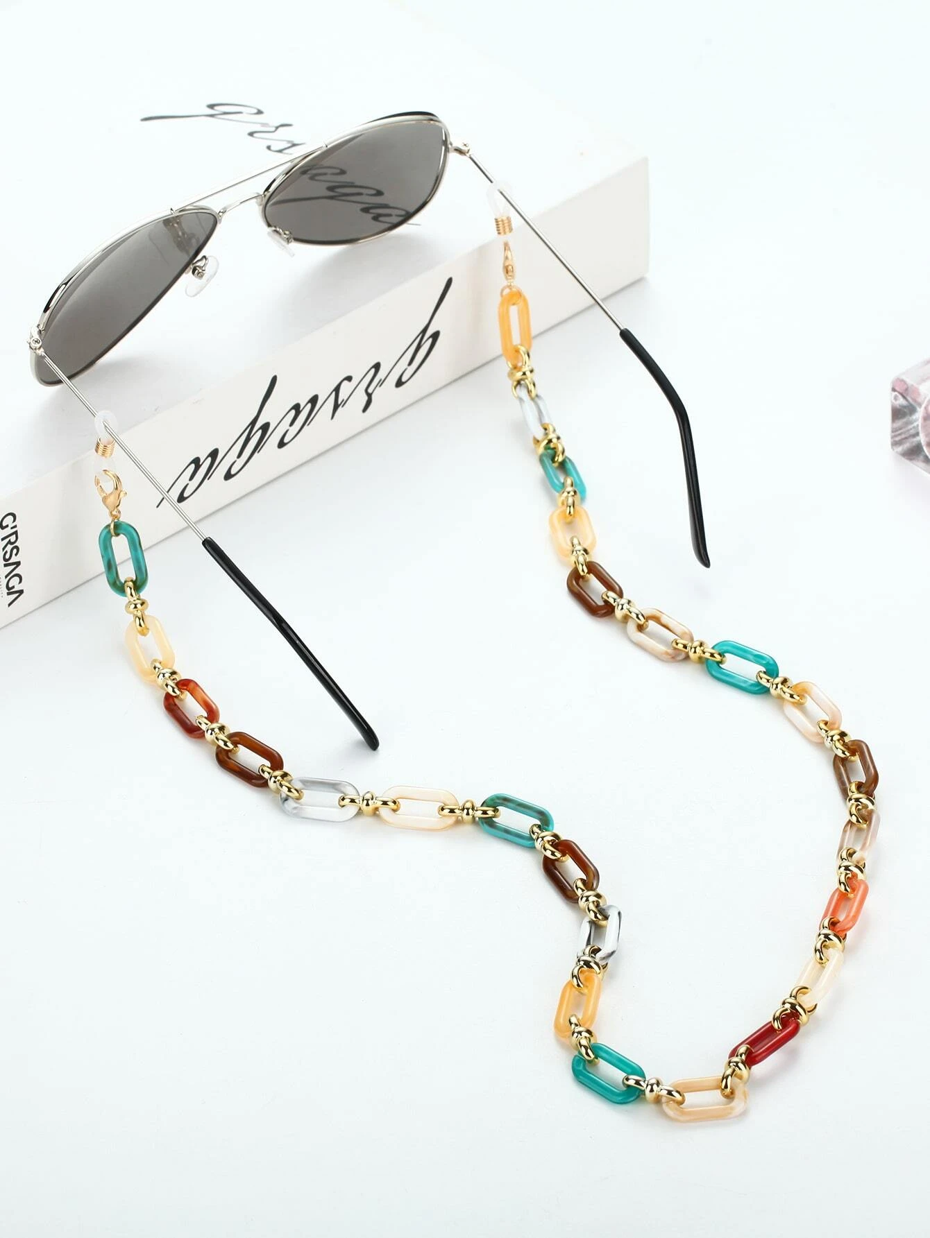 Color block glasses chain, a stylish and functional accessory with color-blocked elements, perfect for keeping your eyewear secure and adding a touch of vibrant charm to your look.